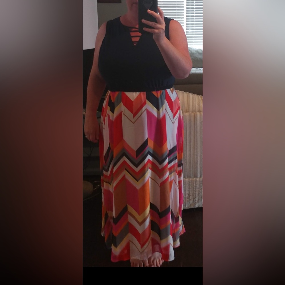 Full length dress.   Light weight and flattering. Almost new